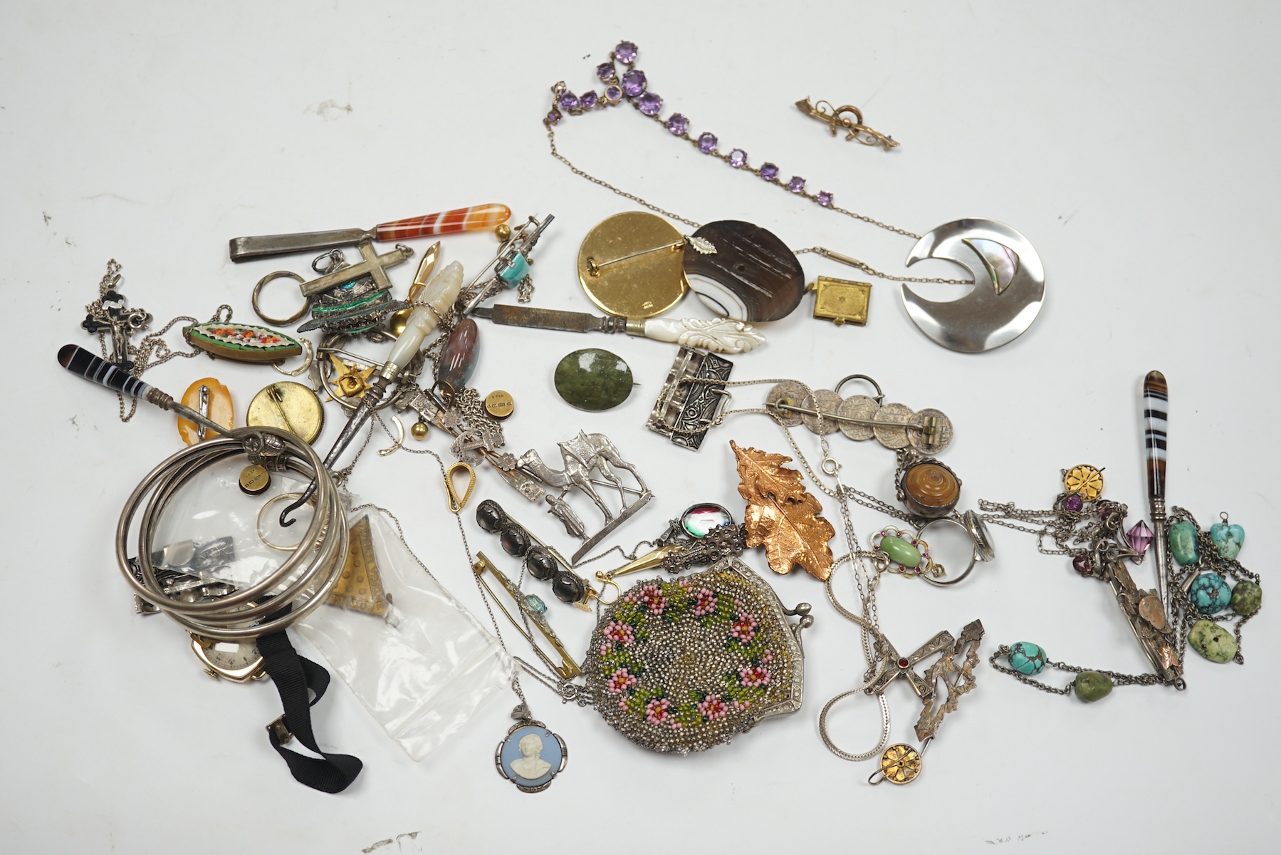 A collection of assorted Victorian and later jewellery, including silver brooch, 9ct ring, amethyst necklace, a 9ct gold manual wind wrist watch, etc. Condition - poor to fair